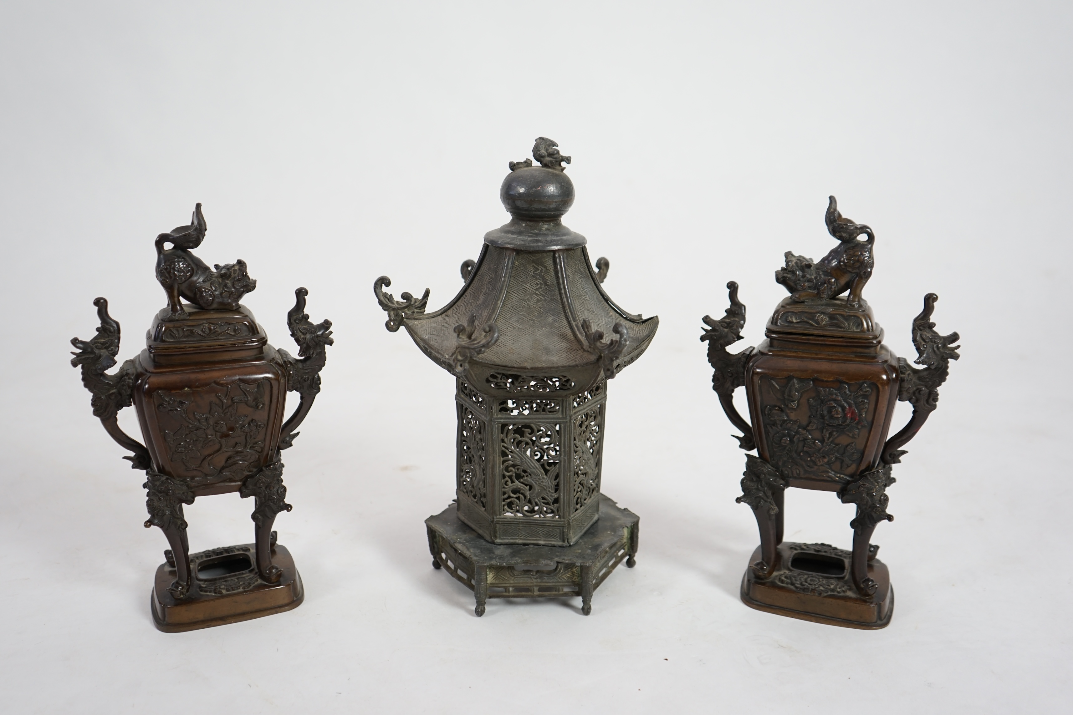 A pair of Japanese bronze koros and covers, late Meiji period